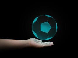 Blue football in hand Black background 3d illustration 3d rendering photo