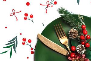 Christmas dinner concept. Vintage old cutlery and christmas ornament on a plate. Christmas concept background