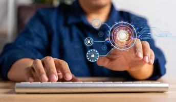 Asian Businessman typing username and password for unlock network connections before assigning bank accounts, credit card, and confidential data. Cyber security internet and networking concept photo