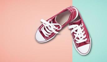 Red sneakers top view isolated on white background photo