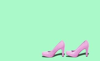 Fashion female pink shoes with heels. Women's footwear casual design isolated on blue background with free space for text. photo