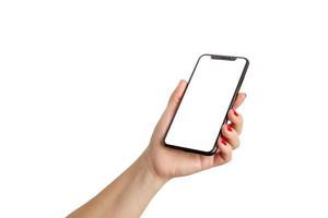 Woman hand holding phone with empty screen on white isolated background photo