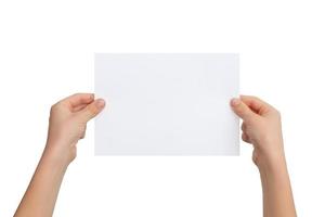 White sheet of paper in the hands of a boy. Horizontal position. Isolated background photo