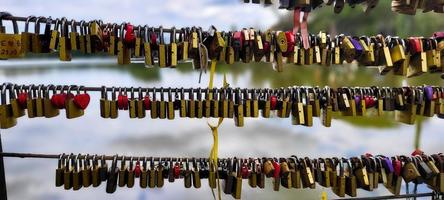 padlocks stuck on bridges of love, love vows padlock photo