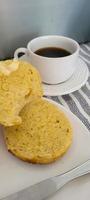 homemade bread made at home with butter on wooden board photo