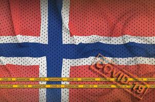Norway flag and orange Covid-19 stamp with border tape. Coronavirus or 2019-nCov virus concept photo