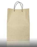 Brown paper bag isolated on white background photo