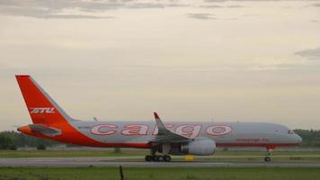 NOVOSIBIRSK, RUSSIAN FEDERATION JULY 15, 2022 - Boeing 757, RA 73352 of Aviastar TU on the runway in the early morning, preparing for takeoff video