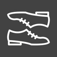 par de zapatos línea icono invertido vector