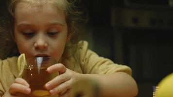 Cheerful little girl tastes New York pizza video