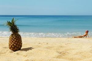 Pineapple on the beach photo