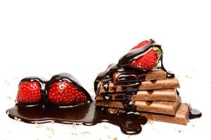 Strawberry and chocolate covored with sweet syrup photo