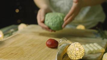 Cake with green dough, sour cherries and sour cream. It also has food ornament and the red star cake video