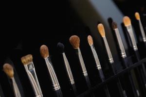 Close up of professional make up brushes photo