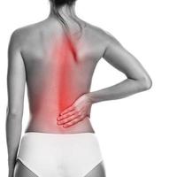 Woman with soruce of pain in her back photo