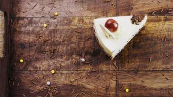 Delicious cherry cake on a wooden tray with decorations video