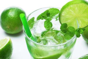 Mojito highball cocktail or refreshing drink with lime and mint photo