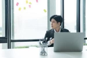 young businessman drinking coffee to relax After working all day. photo