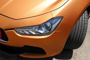 A small fragment of a car body. photo