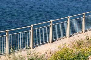 Security fence on the Mediterranean coast. photo