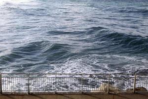 Security fence on the Mediterranean coast. photo