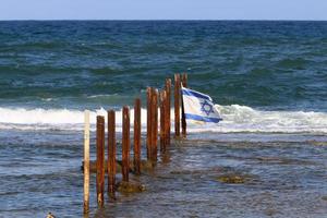 Security fence on the Mediterranean coast. photo
