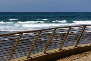 Security fence on the Mediterranean coast. photo