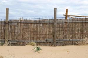 Security fence on the Mediterranean coast. photo