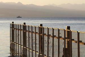 Security fence on the Mediterranean coast. photo