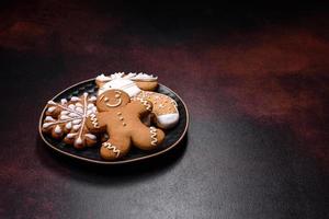 Home festive Christmas table decorated by toys and gingerbreads photo