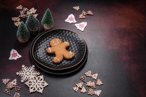 Home festive Christmas table decorated by toys and gingerbreads photo