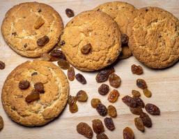 Oatmeal cookies. Cookies with raisins on the table. Raisins on the table. Sweet treat. Healthy diet. photo