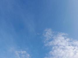 blue sky with puffy clouds background. Natural background. photo