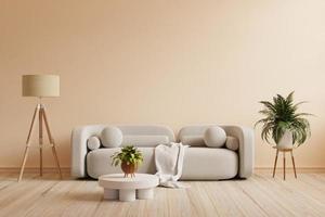 Boho style interior with gray sofa and decor on cream color wall.