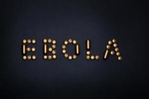 ebola word on black background photo