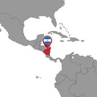 Pin map with Nicaragua flag on world map. Vector illustration.