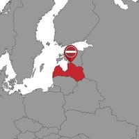 pin mapa con bandera de letonia en el mapa mundial. ilustración vectorial vector