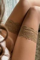 Female legs in stockings photo