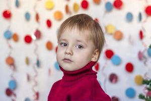 Portrait of a cute boy. Children's emotions. Christmas and new year. photo