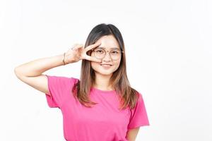 Showing Peace Sign of Beautiful Asian Woman Isolated On White Background photo