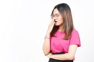 Yawning Gesture of Beautiful Asian Woman Isolated On White Background photo