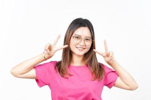 Showing Peace Sign of Beautiful Asian Woman Isolated On White Background photo