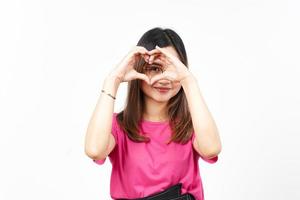 Showing Love Heart Sign of Beautiful Asian Woman Isolated On White Background photo