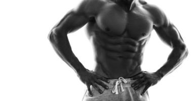 Monochrome picture of muscular male torso photo