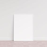 Empty picture frame on wooden floor leaning against wall. Blank poster frame standing on wooden floor. Blank poster frame mockup. Empty picture frame mockup. 3d rendering. photo