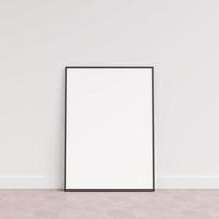 Empty picture frame on wooden floor leaning against wall. Blank poster frame standing on wooden floor. Blank poster frame mockup. Empty picture frame mockup. 3d rendering. photo