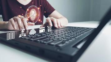 Person touching screen to fingerprint scanner, security access information, big data management concept, Internet of things, cloud computing, internet connection, shopping online and cashless society. photo
