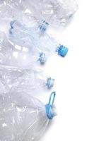 Concepts of pollution and recycling. Different used plastic bottles photo