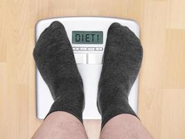 diet on digital display of personal scales photo