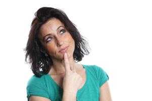 pensive young woman with thought bubble photo